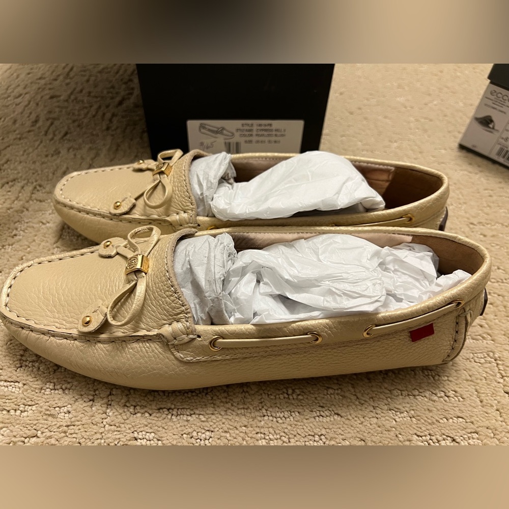 Marc Joseph Cream Leather Flats with Moccasin Stitching